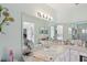 Bright bathroom with a large vanity, ample counter space, and modern lighting at 9857 Sw 63Rd Ct, Ocala, FL 34476