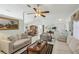 The open-concept living room flows into the dining area, perfect for entertaining and Gathering gatherings at 9857 Sw 63Rd Ct, Ocala, FL 34476