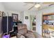 Functional office with a work space, storage, and natural light at 9857 Sw 63Rd Ct, Ocala, FL 34476