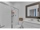 Bathroom featuring glass shower, white vanity, and modern fixtures creating a clean and inviting space at 197 Pineywoods St, St Cloud, FL 34772