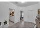 Inviting entryway with tiled floors leads to a bathroom and bedroom, creating a seamless transition at 197 Pineywoods St, St Cloud, FL 34772