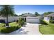 Aerial view of the house, lawn and neighborhood at 2186 Quinn Ln, The Villages, FL 32162