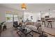 Inviting living area connected to the kitchen, creating an ideal entertaining space at 2897 Sunridge Loop, St Cloud, FL 34771