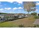 Fenced backyard featuring a well-maintained lawn at 29447 Caspian St, Leesburg, FL 34748