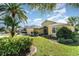 Beautiful landscaping with a well-manicured lawn surrounds this attractive home at 2982 Lake Huron Ln, Tavares, FL 32778