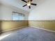 Bedroom features carpeted floors, fan, and a window at 3827 Westerham Dr, Clermont, FL 34711