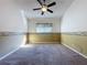 Bedroom features carpeted floors, fan, and a window at 3827 Westerham Dr, Clermont, FL 34711