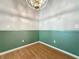 Dining Room with hardwood flooring and decorative light fixture at 3827 Westerham Dr, Clermont, FL 34711