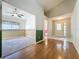 Living Room with hard wood flooring and open concept at 3827 Westerham Dr, Clermont, FL 34711