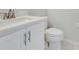 Bathroom vanity with white cabinets, quartz countertop, and modern fixtures at 4703 Golden Beach Ct, Kissimmee, FL 34746