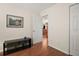 Bonus room with hardwood floors and easy access to the main living area at 604 Juanita Ct, The Villages, FL 32159