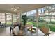 Enjoy your time in this roomy sunroom with lots of windows and a ceiling fan at 604 Juanita Ct, The Villages, FL 32159