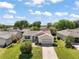 Ariel view of a well-maintained house with beautiful landscaping at 7650 Se 174Th Gaillard Pl, The Villages, FL 32162