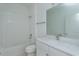 Bathroom featuring a shower and tub combination, a white marble vanity, and modern fixtures at 995 Fiesta Key Cir, Lady Lake, FL 32159