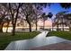 Picturesque backyard with a private dock and tranquil lake views, creating an idyllic outdoor oasis at 15749 Acorn Cir, Tavares, FL 32778