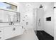 Modern bathroom with a glass-enclosed shower and stylish fixtures at 15749 Acorn Cir, Tavares, FL 32778