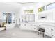 Relaxing bathroom showcasing a tub, vanity, and views to the outside at 15749 Acorn Cir, Tavares, FL 32778