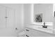 Bright bathroom with elegant vanity, sleek fixtures, and contemporary design elements at 15749 Acorn Cir, Tavares, FL 32778