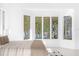 Tranquil bedroom offering scenic lake views at 15749 Acorn Cir, Tavares, FL 32778