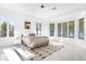 Serene bedroom featuring natural light and cozy decor at 15749 Acorn Cir, Tavares, FL 32778
