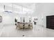 Spacious dining area with open floor plan and bar area, perfect for entertaining at 15749 Acorn Cir, Tavares, FL 32778