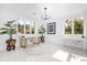 Bright home office featuring natural light, modern desk, and stylish decor for a productive workspace at 15749 Acorn Cir, Tavares, FL 32778