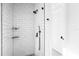 Stylish shower with subway tile, and modern fixtures at 15749 Acorn Cir, Tavares, FL 32778
