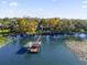 Scenic waterfront property with a private dock and tranquil lake views at 15749 Acorn Cir, Tavares, FL 32778