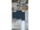 Birds-eye view of the new home and its black roof at 40327 Royal Trails Rd, Eustis, FL 32736