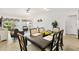 Open-concept living area with plenty of seating and lots of natural light at 206 Desota Ct, The Villages, FL 32159