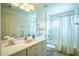 Clean bathroom featuring a shower/tub combo and a neutral decor at 5441 Sea Leopard St, Tavares, FL 32778