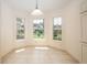 A bright dining area with a bay window providing plenty of natural light at 5441 Sea Leopard St, Tavares, FL 32778