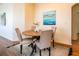 Cozy dining room featuring modern furniture and a painting at 5441 Sea Leopard St, Tavares, FL 32778