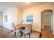 Cozy dining room featuring modern furniture and a painting at 5441 Sea Leopard St, Tavares, FL 32778