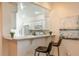 Bright kitchen with modern appliances, breakfast bar, and ample counter space at 5441 Sea Leopard St, Tavares, FL 32778