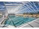 Indoor community pool with ample space for sunbathing at 5441 Sea Leopard St, Tavares, FL 32778