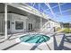 Enclosed jacuzzi area with ample space for seating at 5441 Sea Leopard St, Tavares, FL 32778