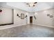 Spacious main bedroom with trey ceiling and views of the walk-in closet at 10417 Lake Louisa Rd, Clermont, FL 34711