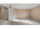 Spacious bedroom with neutral carpet, recessed lighting, and two large closets at 10651 Arrowtree Blvd, Clermont, FL 34715