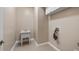 Functional laundry room with a utility sink and hook-ups for a washer and dryer at 10651 Arrowtree Blvd, Clermont, FL 34715