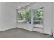 Enclosed patio offers a versatile space for relaxation or entertainment at 1112 Elkhart Cir, Tavares, FL 32778