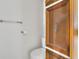 Bathroom featuring a toilet, towel rack, and toilet paper holder at 1112 Elkhart Cir, Tavares, FL 32778