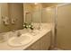 Dual sink bathroom has shower, tub and ample counter space at 1135 Easley Way, The Villages, FL 32162