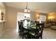 Inviting dining space with seating for six and views to the living room at 1135 Easley Way, The Villages, FL 32162