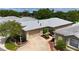 Charming single-Gathering home with a well-maintained lawn, a two-car garage, and a welcoming front entrance at 1135 Easley Way, The Villages, FL 32162