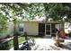 Outdoor patio with a view of screened in lanai, fountain and seating, excellent for entertaining at 1135 Easley Way, The Villages, FL 32162
