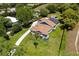 Overhead view of home with beautiful landscaping and a long driveway at 11619 Lane Park Rd, Tavares, FL 32778