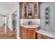 Coffee bar with rich wood cabinets, granite counters and corner location at 11619 Lane Park Rd, Tavares, FL 32778
