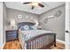 Cozy bedroom with decorative flowers, wall art, and coordinated decor at 11619 Lane Park Rd, Tavares, FL 32778