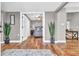 View of a serene bedroom featuring a neutral color palette and decorative elements at 11619 Lane Park Rd, Tavares, FL 32778